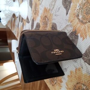 Brown coach,trifold women's wallet